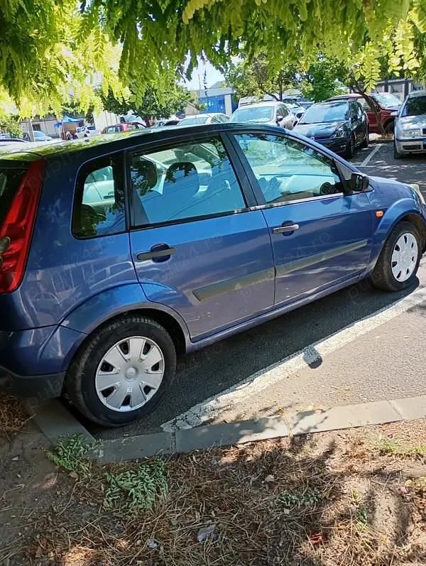 Second-hand Ford Fiesta 75 CP (55 kW) 2006 Albastru Hatchback