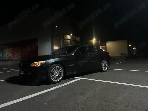 Gri Utilizat 2012 BMW 740 Berlinǎ | 12.999 EUR (Preț bun) - Imagine 1/4