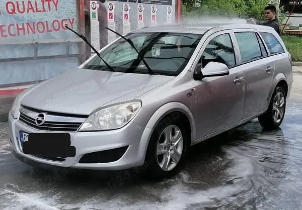 Utilizat 2010 Opel Astra Break | 2.100 EUR (Preț bun) - Imagine 1/4