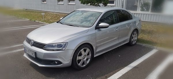 Gri Utilizat 2011 VW Jetta Berlinǎ | 6.800 EUR (Puțin scump) - Imagine 1/4