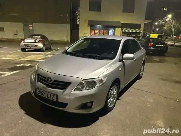 Gri Utilizat 2007 Toyota Corolla Berlinǎ | 4.200 EUR - Imagine 1/4