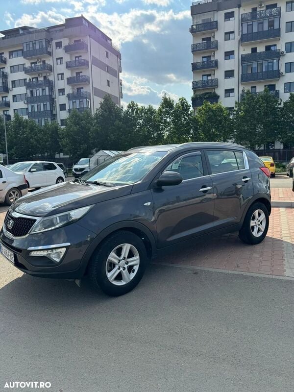 Gri Utilizat 2015 Kia Sportage Style SUV | 8.650 EUR (Super Preț) - Imagine 1/4