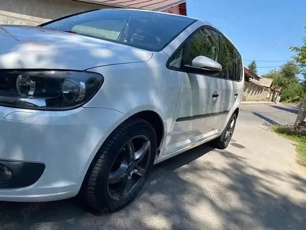 Second-hand VW Touran 105 CP (77 kW) 2013 Monovolum