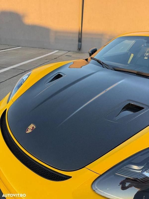 Second-hand Porsche 718 Cayman 300 CP (220 kW) 2018 Culoaregalbeuriu Coupe