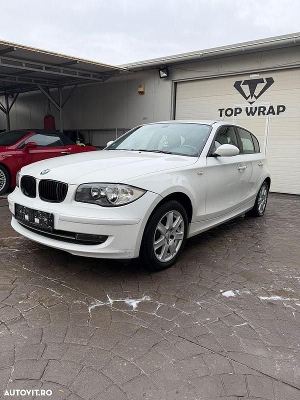 Second-hand BMW 116 115 CP (84 kW) 2008 Culoarealb Hatchback