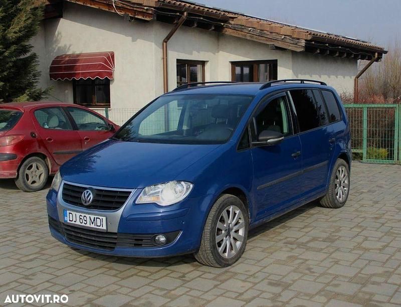 Second-hand VW Touran 105 CP (77 kW) 2009 Culoarealbastru Monovolum
