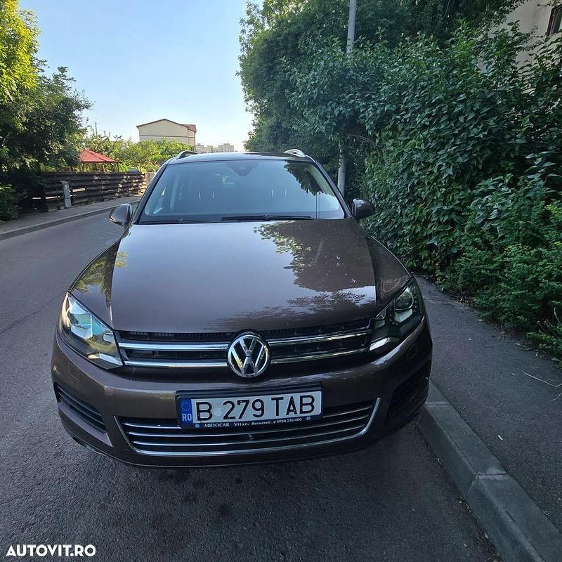 Culoaremaro Utilizat 2010 VW Touareg SUV | 14.200 EUR (Preț OK) - Imagine 1/4