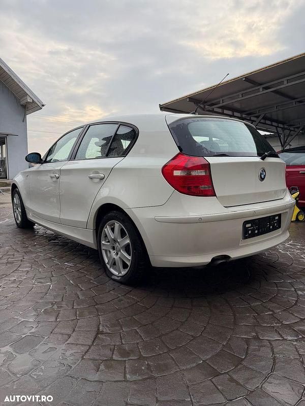 Second-hand BMW 116 115 CP (84 kW) 2008 Culoarealb Hatchback
