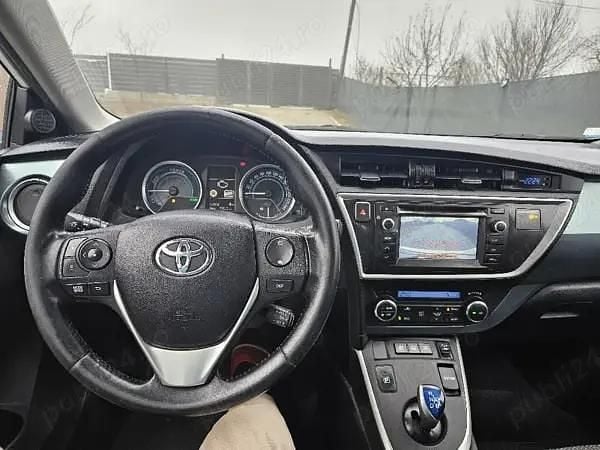 Second-hand Toyota Auris Hybrid 98 CP (72 kW) 2013 Break