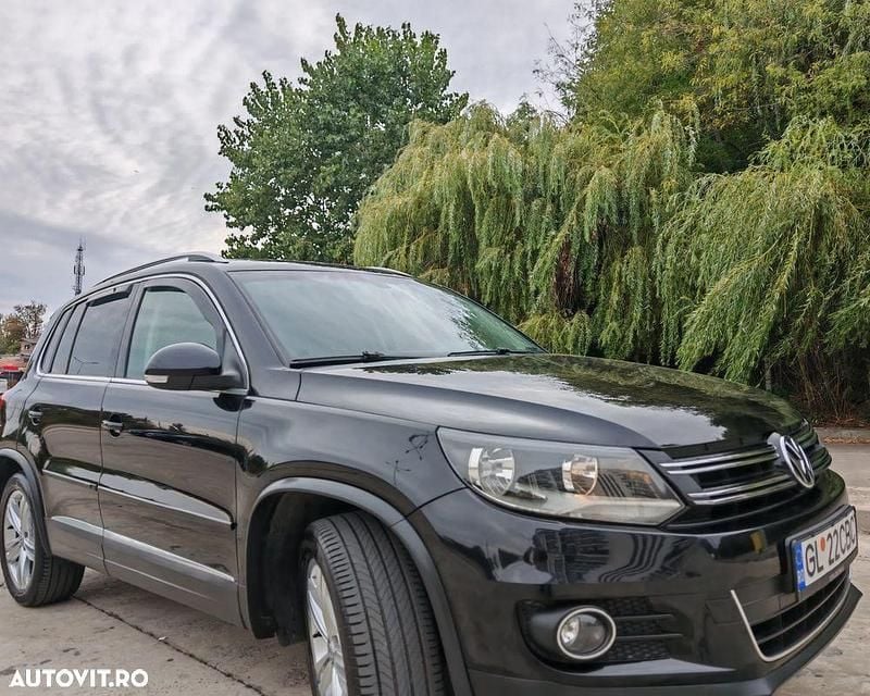 Culoarenegru Utilizat 2013 VW Tiguan Sportline SUV | 12.250 EUR (Preț OK) - Imagine 1/4