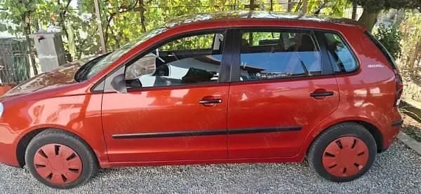 Second-hand VW Polo 40 CP (29 kW) 2006 Portocaliu Hatchback