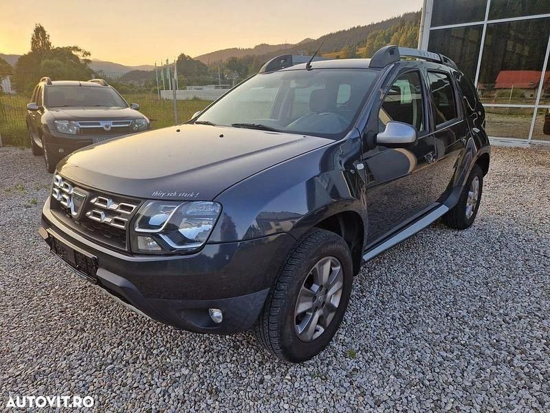 Gri Utilizat 2015 Dacia Duster Prestige SUV | 10.690 EUR (Preț OK) - Imagine 1/2