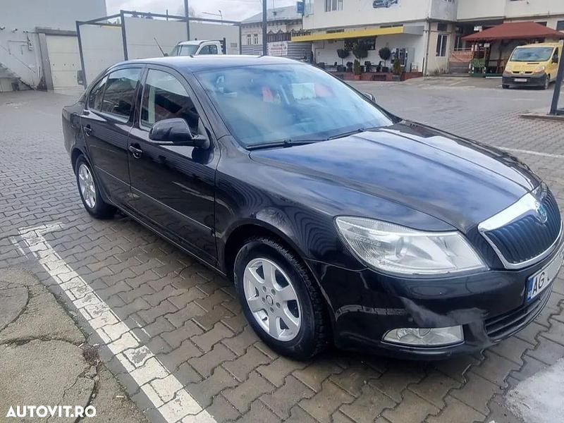 Culoarenegru Second-hand 2012 Skoda Octavia Business Line Berlinǎ | 6.000 EUR (Preț OK) - Imagine 1/4