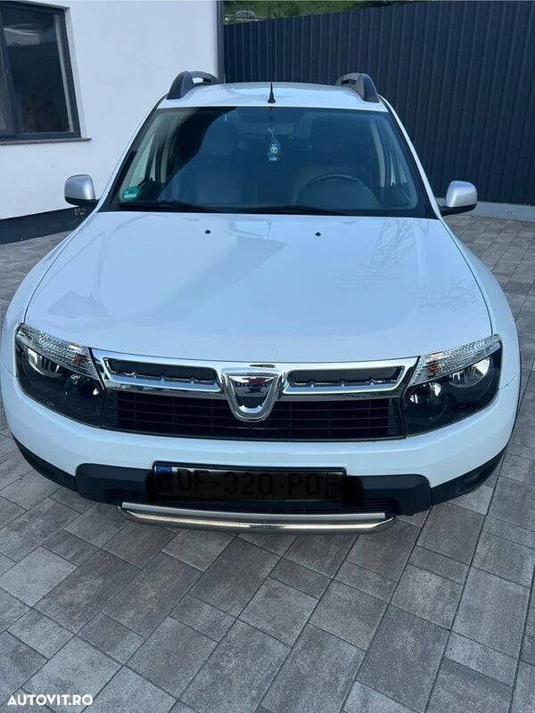 Alb Utilizat 2012 Dacia Duster Lauréate SUV | 7.490 EUR (Preț bun) - Imagine 1/4
