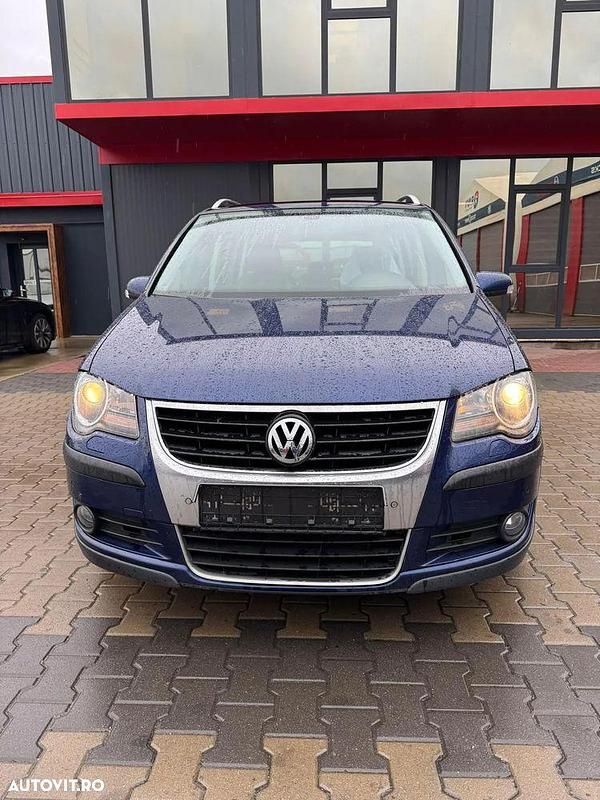 Second-hand VW Touran 140 CP (102 kW) 2007 Culoarealbastru Monovolum