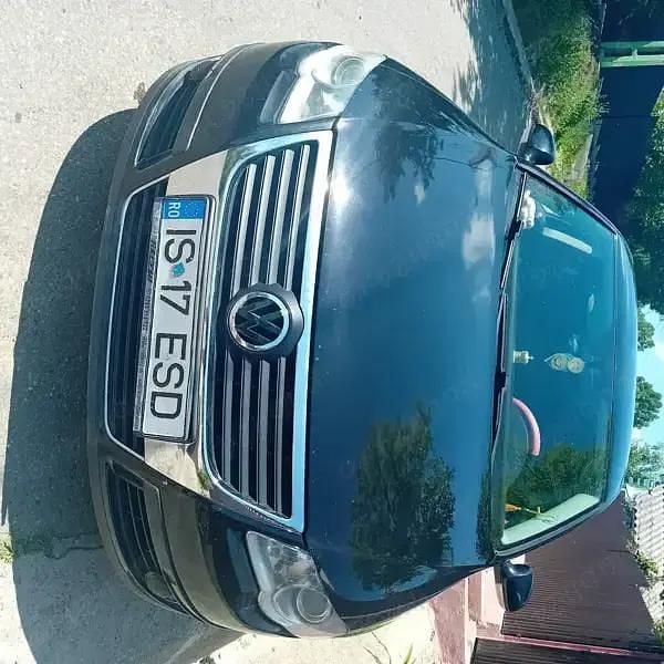 Second-hand VW Passat 105 CP (77 kW) 2006 Negru Berlinǎ