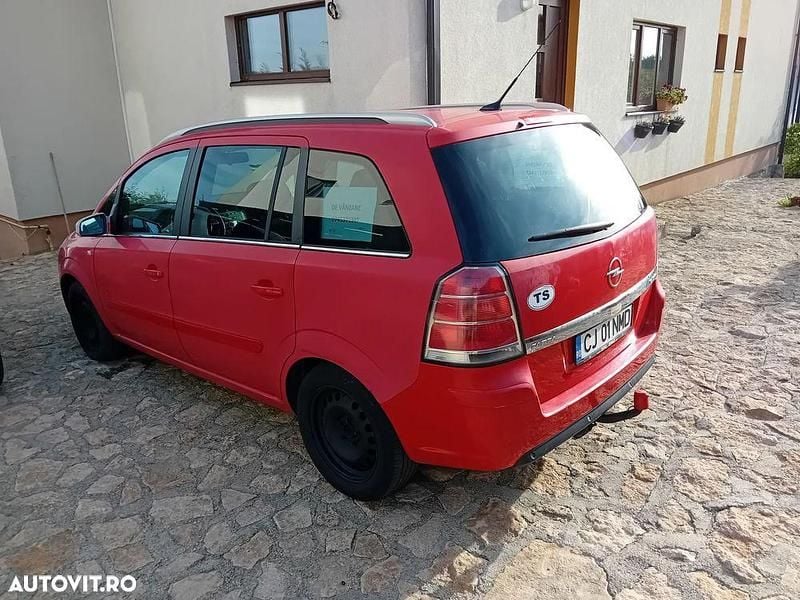 Culoarerosu Utilizat 2006 Opel Zafira Monovolum | 1.400 EUR (Preț bun) - Imagine 1/4