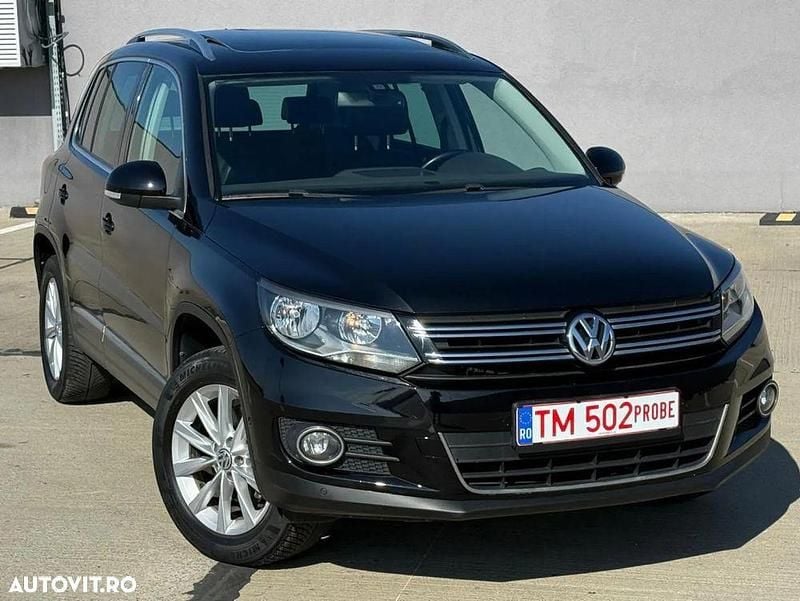 Culoarenegru Utilizat 2014 VW Tiguan Exclusive SUV | 9.950 EUR (Preț bun) - Imagine 1/4