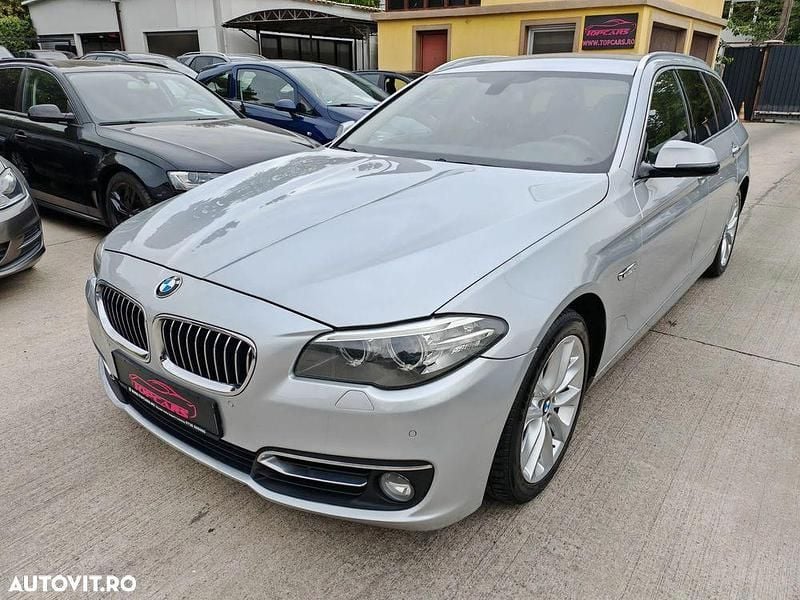 Culoareargint Utilizat 2014 BMW 518 Luxury Line Break | 9.999 EUR (Preț OK) - Imagine 1/4