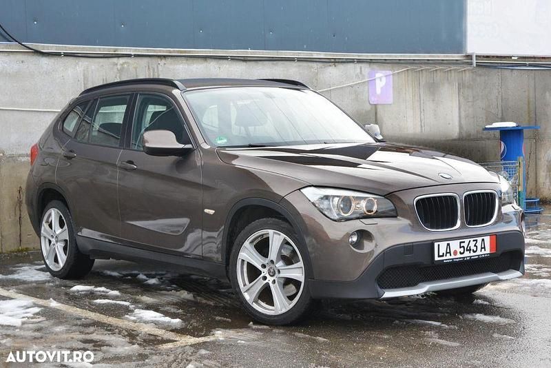Second-hand BMW X1 Sport Line 143 CP (105 kW) 2011 Culoaremaro SUV