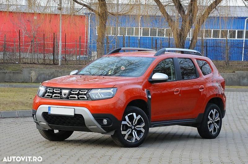 Culoareportocaliu Second-hand 2022 Dacia Duster Prestige SUV | 12.900 EUR (Preț bun) - Imagine 1/4