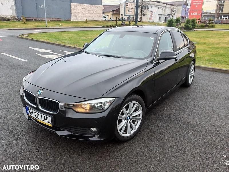 Culoarenegru Utilizat 2014 BMW 316 Berlinǎ | 8.290 EUR (Super Preț) - Imagine 1/4