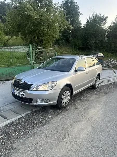 Gri Utilizat 2010 Skoda Octavia Ambition Break | 4.850 EUR (Preț OK) - Imagine 1/4