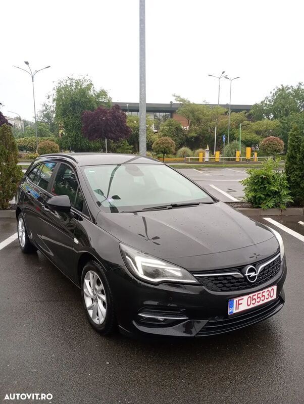 Albastru Utilizat 2020 Opel Astra Business Edition Break | 8.300 EUR (Preț OK) - Imagine 1/4