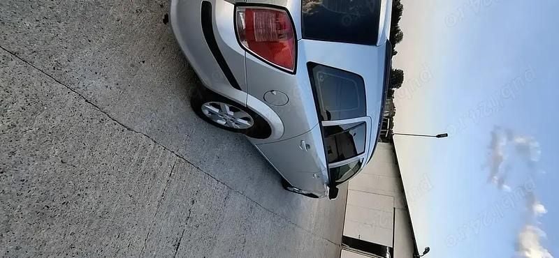 Gri Utilizat 2005 Opel Astra Break | 2.300 EUR (Puțin scump) - Imagine 1/4