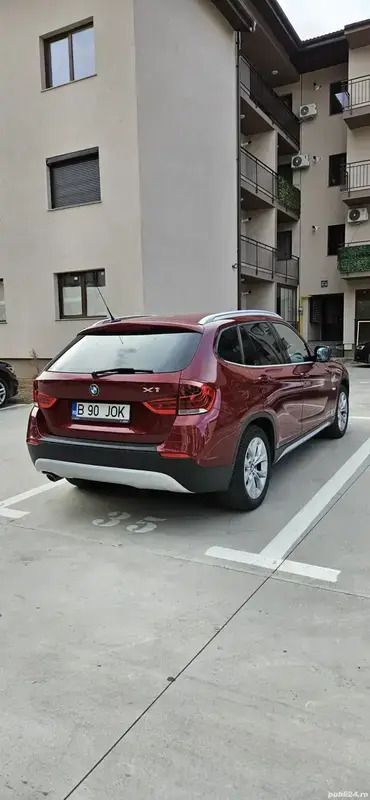 Rosu Utilizat 2012 BMW X1 SUV | 9.500 EUR (Preț bun) - Imagine 1/3