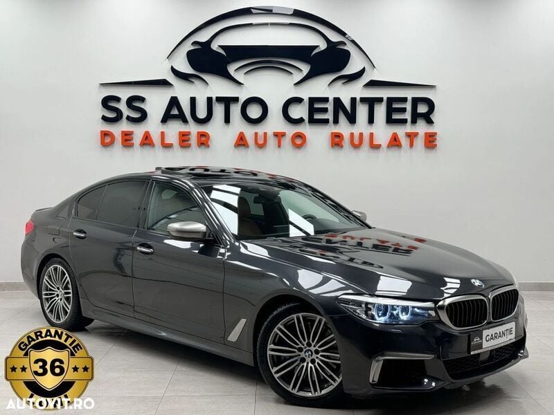 Gri Utilizat 2018 BMW M550 Berlinǎ | 35.990 EUR - Imagine 1/4