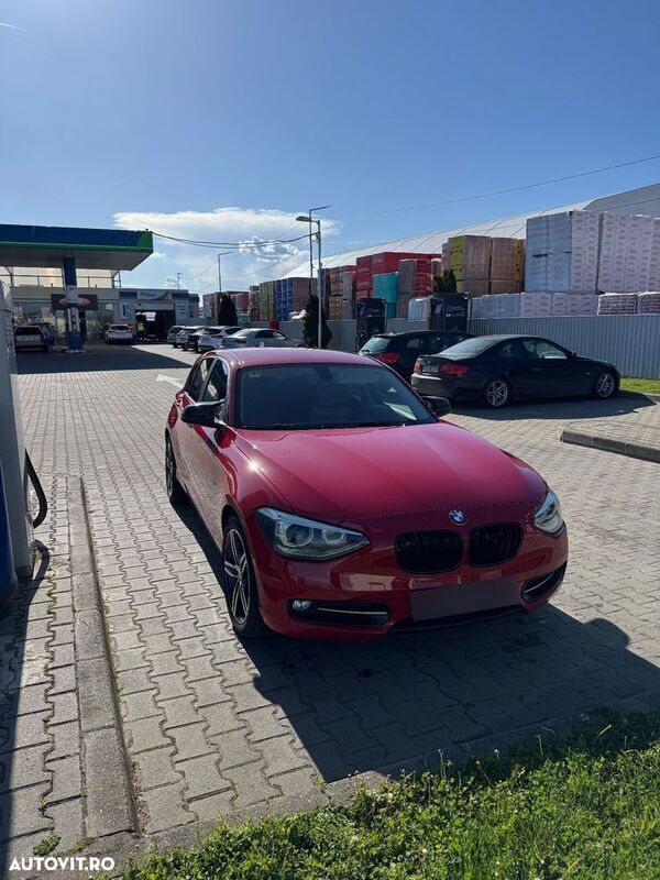 Rosu Utilizat 2011 BMW 118 Sport Line Hatchback | 6.900 EUR - Imagine 1/4