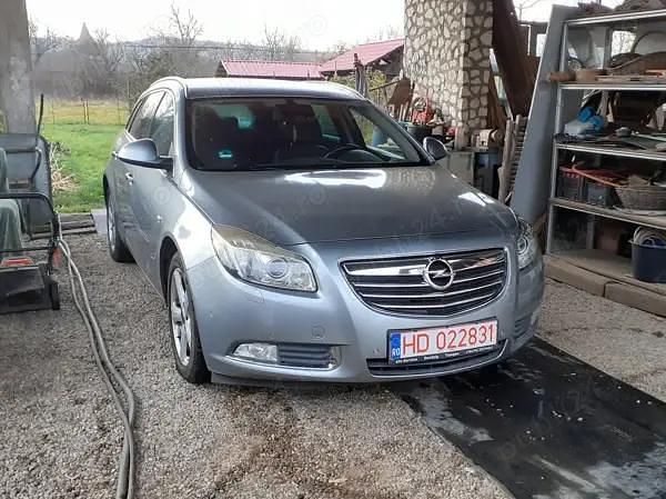 Second-hand Opel Insignia 160 CP (117 kW) 2010 Argintiu Break