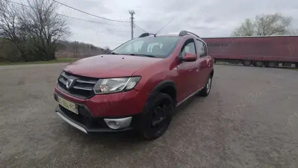 Rosu Utilizat 2014 Dacia Sandero Stepway Hatchback | 3.599 EUR (Preț bun) - Imagine 1/4