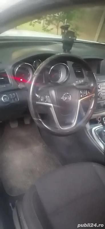 Second-hand Opel Insignia 160 CP (117 kW) 2010 Alb Berlinǎ