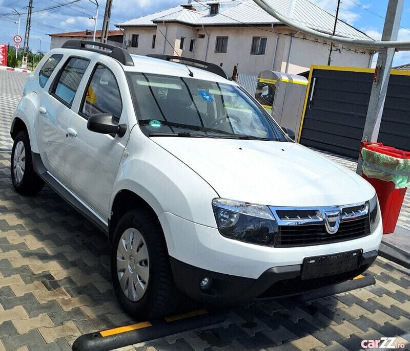 Alb Utilizat 2012 Dacia Duster SUV | 6.699 EUR (Preț OK) - Imagine 1/4