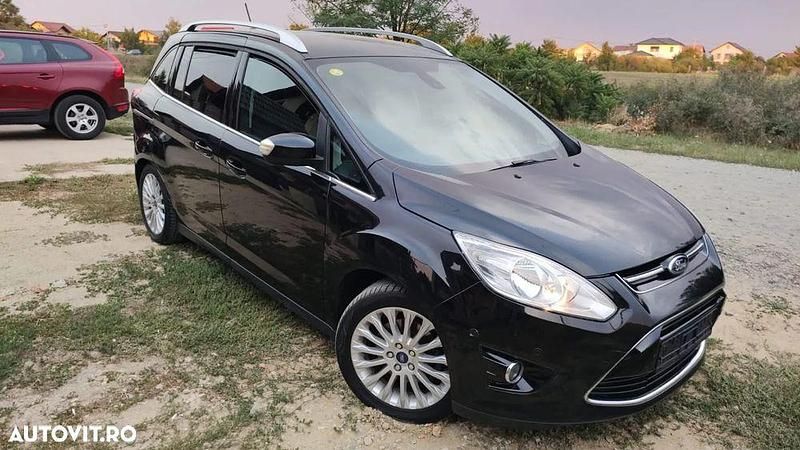Culoarenegru Utilizat 2012 Ford C-MAX Titanium Monovolum | 3.999 EUR (Preț bun) - Imagine 1/4