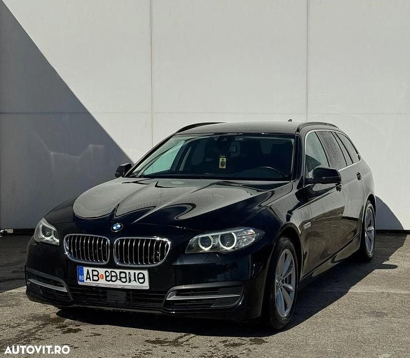 Second-hand BMW 520 Comfort Edition 184 CP (135 kW) 2015 Culoarenegru Break