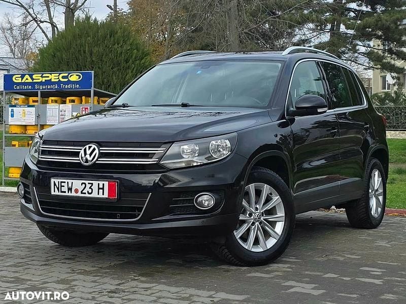 Culoarenegru Utilizat 2014 VW Tiguan Sportline SUV | 9.450 EUR (Super Preț) - Imagine 1/4