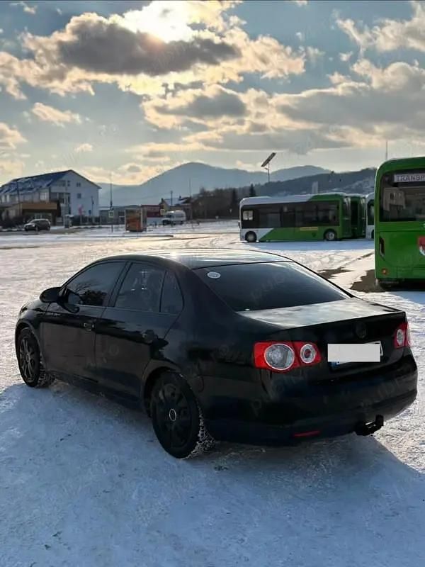 Second-hand VW Jetta 140 CP (102 kW) 2009 Negru Berlinǎ