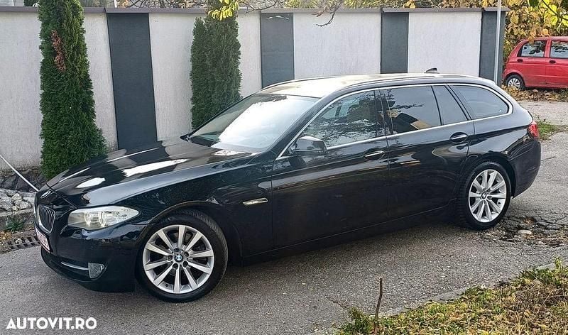 Second-hand BMW 520 Sport Line 184 CP (135 kW) 2012 Culoarenegru Break