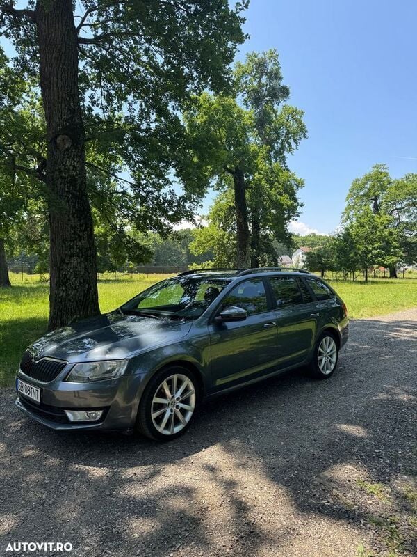 Gri Utilizat 2014 Skoda Octavia Ambition Break | 8.990 EUR (Preț bun) - Imagine 1/4