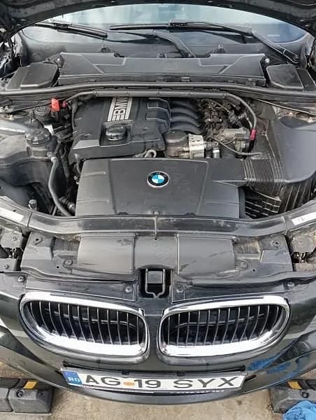 Second-hand BMW 318 143 CP (105 kW) 2010 Negru Berlinǎ