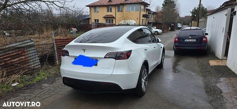 Second-hand Tesla Model Y 339 kW (462 CP) 2023 Culoarealb SUV
