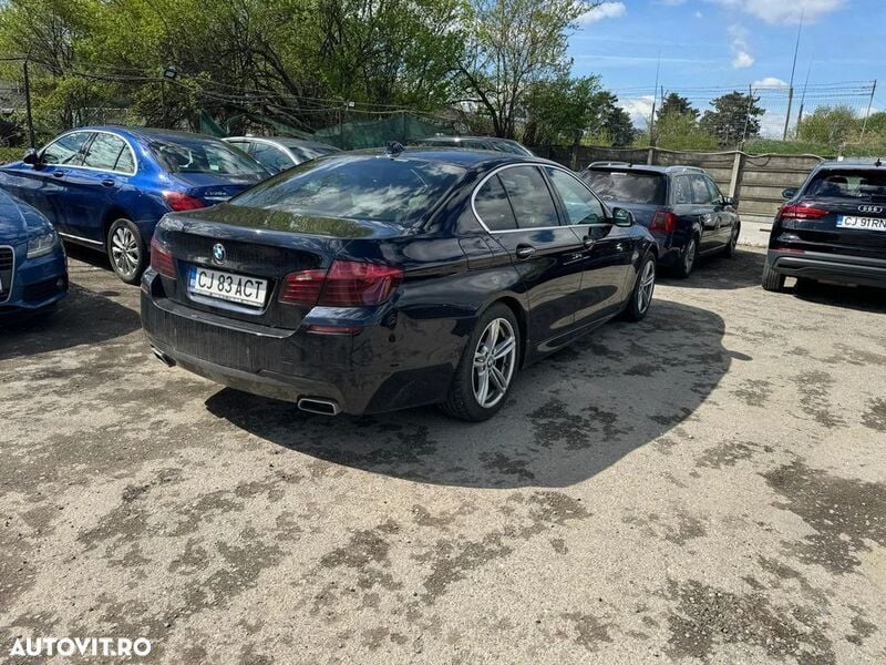 Second-hand BMW 535 Comfort Edition 313 CP (230 kW) 2014 Negru Berlinǎ
