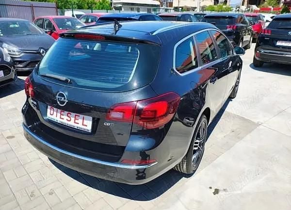 Second-hand Opel Astra Exklusiv 136 CP (100 kW) 2015 Negru Break