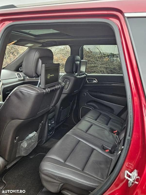 Second-hand Jeep Grand Cherokee Summit 250 CP (183 kW) 2015 Culoarerosu SUV