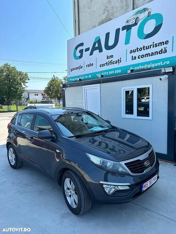 Negru Utilizat 2014 Kia Sportage Attract SUV | 8.350 EUR (Preț bun) - Imagine 1/4