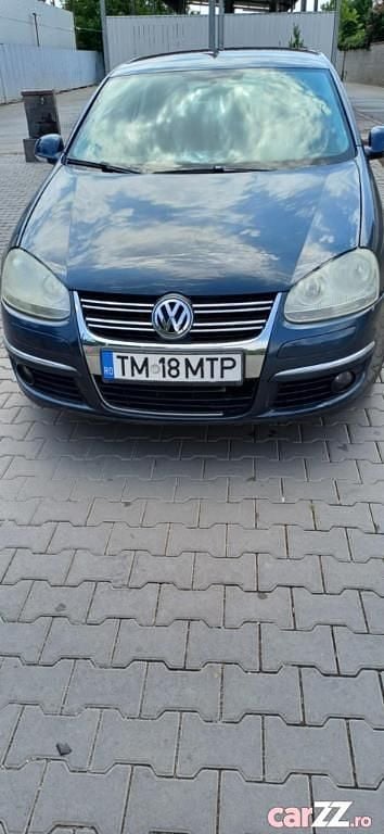 Second-hand VW Jetta 75 CP (55 kW) 2007 Albastru Berlinǎ