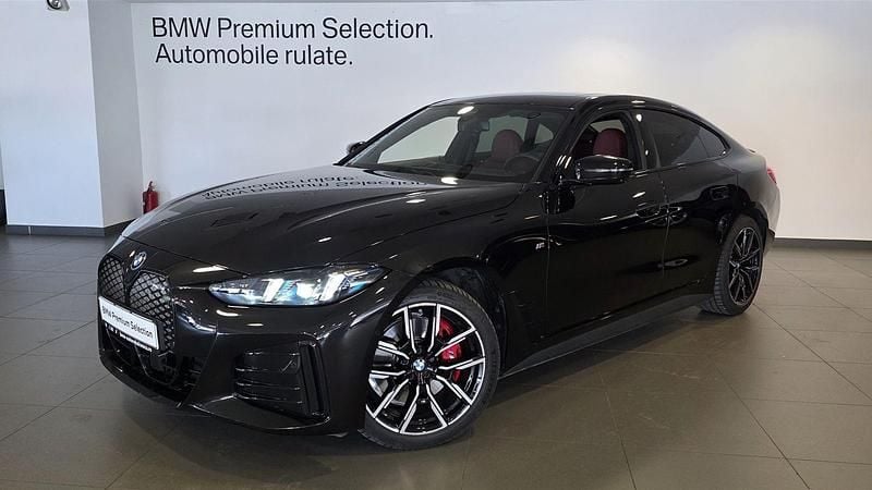 Negru sapphire metalizat Utilizat 2025 BMW i4 Comfort Edition Berlinǎ | 55.870 EUR (Super Preț) - Imagine 1/4